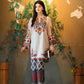 Woman in traditional embroidered outfit standing in front of a world map backdrop