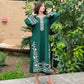 Woman wearing a green embroidered dress  House Of Beenora | Best women clothing brand in Pakistan