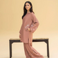 Woman wearing a pink outfit with floral patterns House of Beenora |  Best women clothing brand in Pakistan