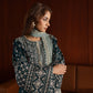 Woman wearing a patterned outfit with a scarf House of Beenora |  Best women clothing brand in Pakistan