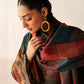 Woman wearing a colorful patchwork House Of Beenora | Best women clothing brand in Pakistan