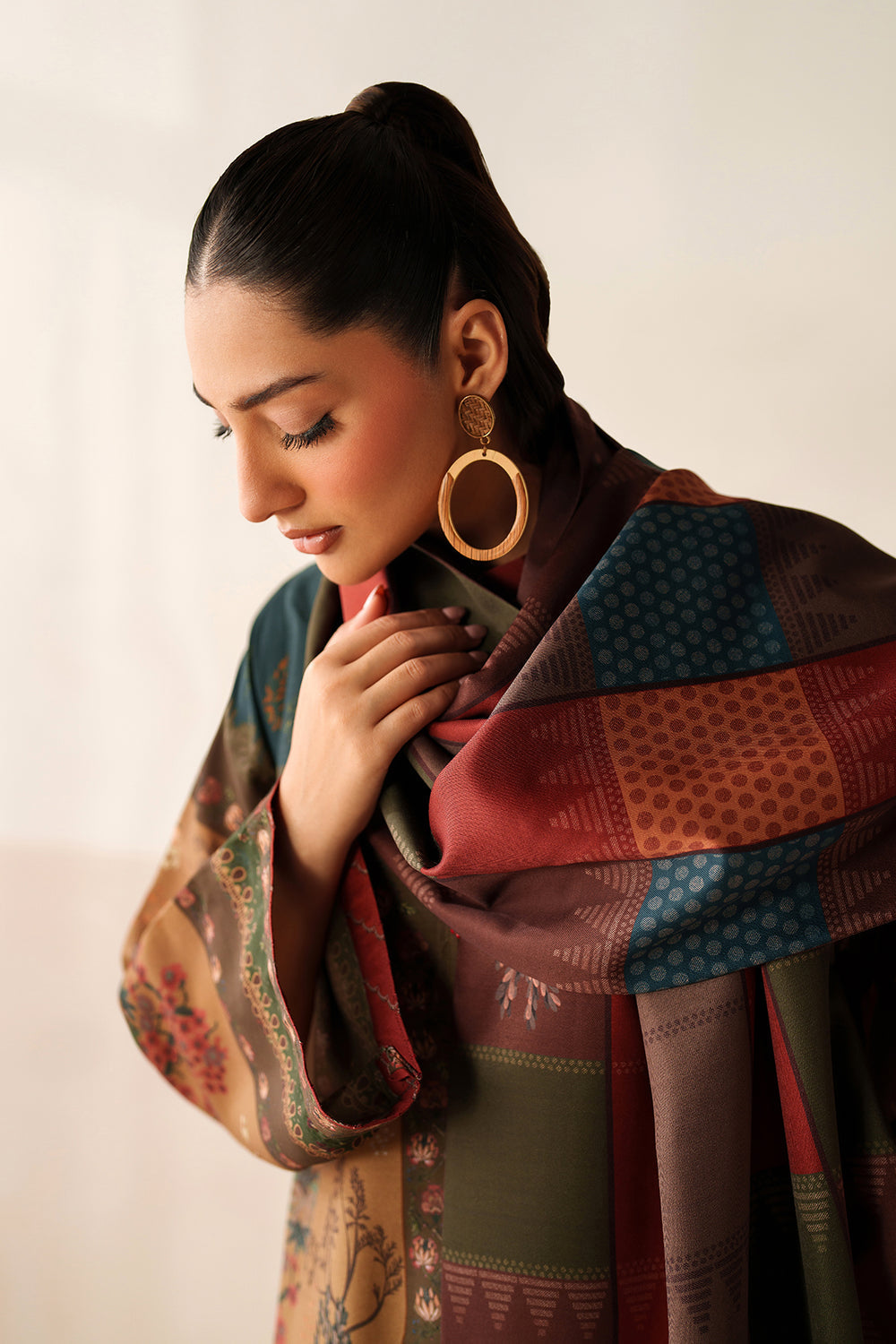 Woman wearing a colorful patchwork House Of Beenora | Best women clothing brand in Pakistan