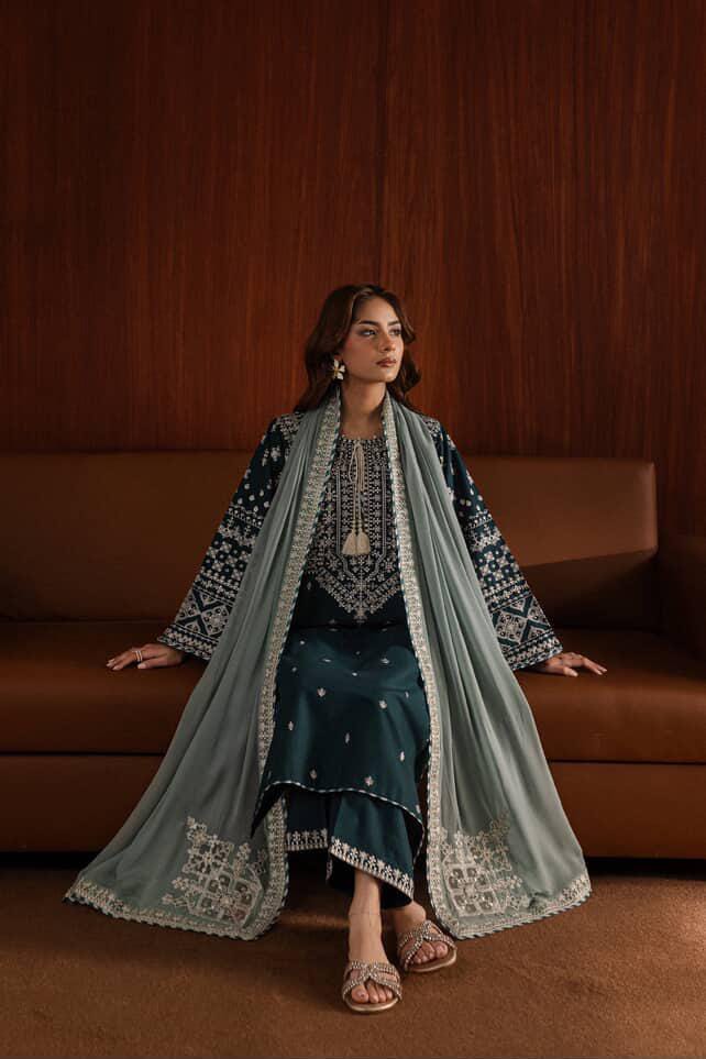 Woman in traditional outfit with embroidered top and green skirt House of Beenora |  Best women clothing brand in Pakistan